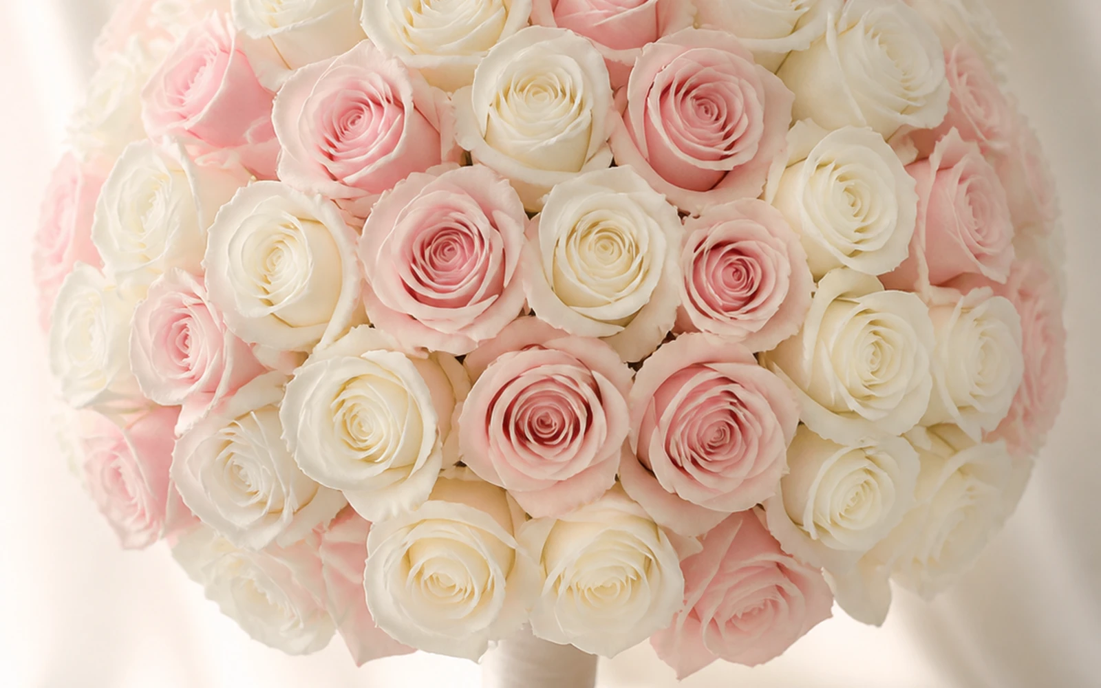 Formal round bouquet with a centered symmetrical floral dome