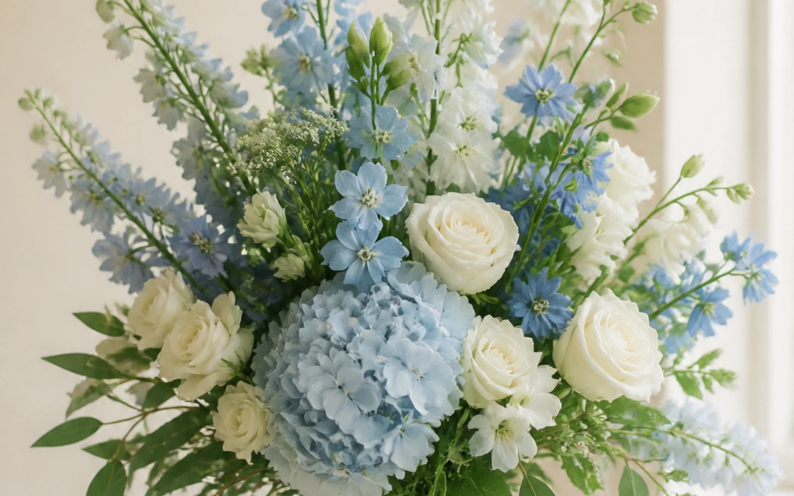 Coastal blue and white wedding bouquet with airy vertical movement